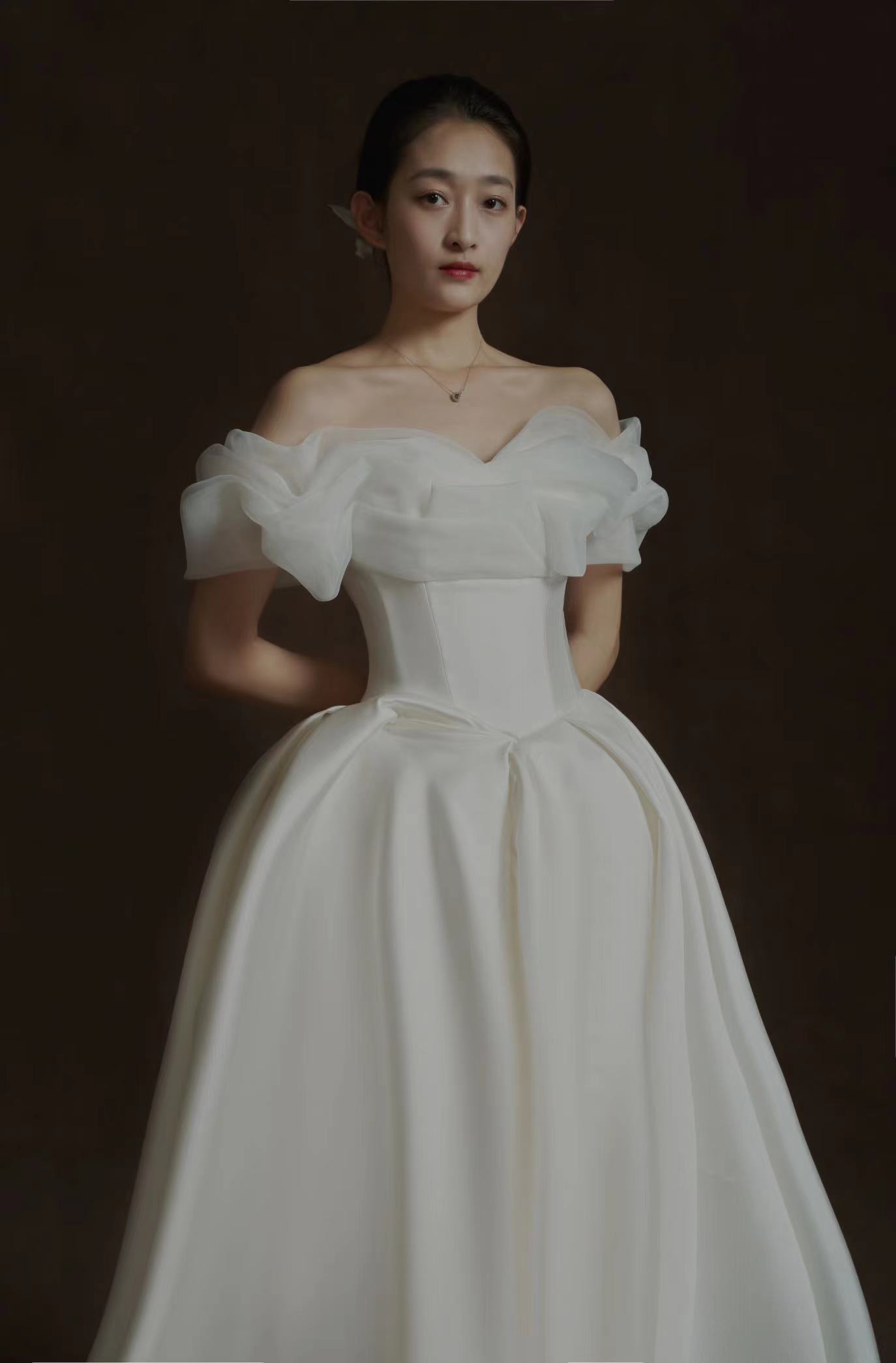 Off-shoulder wedding gown